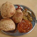 One of my favorite breakfasts after a sunrise stroll along the Ganga, or Ganges River: fresh puris with potato curry, some spicy pickle, and a just-made jilebi, filled with sweet, warm syrup. More chai please!