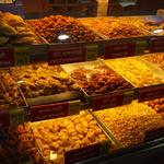 Larger sweet shops may include a section devoted to fried salty snacks, or namkeens. This multi-storied sweet shop is in Pune, in Maharashtra state. Sweets pair well with namkeens, especially with a nice cup of chai.