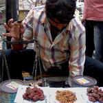 You can't have great food without great markets. In Old Delhi this hingwala weighs out grams of asafetida resin, the precious, pungent flavoring so important to Indian vegetarian cooking (also used in ayurvedic medicine), 